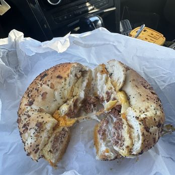 Yum Yum Donuts - Chorizo and egg with cream cheese on onion bagel - Donuts Near Me - Burbank, California Yum Yum Donuts - Chorizo and egg with cream cheese on onion bagel - Donuts Near Me - Burbank, California