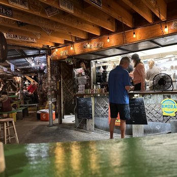 BO's Fish Wagon - a man and a woman standing at the counter - Seafood Near Me - Key West, Florida BO's Fish Wagon - a man and a woman standing at the counter - Seafood Near Me - Key West, Florida
