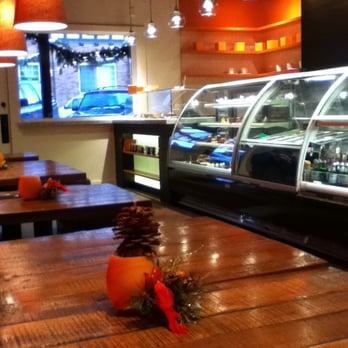 CocoLove - A small seating area and a relaxed, warm feel to the brown and orange themed shop. - Coffee & Tea Near Me - Jackson, Wyoming