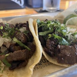 Asada Taco with cilantro and onions.