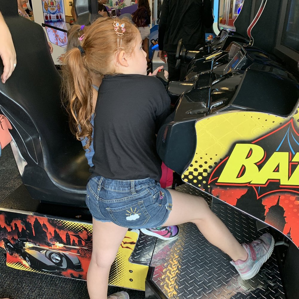 Chuck E. Cheese - The bday girl helping her sister with the pedals, she couldn't reach them ha ha ha - Pizza Near Me - Miami, Florida Chuck E. Cheese - The bday girl helping her sister with the pedals, she couldn't reach them ha ha ha - Pizza Near Me - Miami, Florida