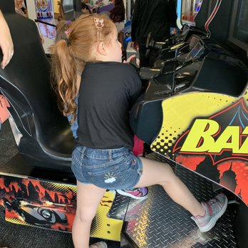 Chuck E. Cheese - The bday girl helping her sister with the pedals, she couldn't reach them ha ha ha - Pizza Near Me - Miami, Florida