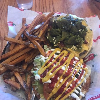The New Mexicans - Rio Burger topped with Hatch chiles. - New Mexican Cuisine Near Me - Everett, Washington The New Mexicans - Rio Burger topped with Hatch chiles. - New Mexican Cuisine Near Me - Everett, Washington