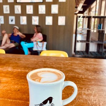 Redstart Roasters - a cup of coffee on a table - Coffee Roasteries Near Me - Pittsburgh, Pennsylvania