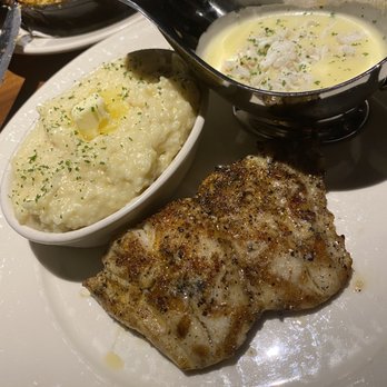 131 MAIN Restaurant - Season grouper with cheese girts with a cream crab sauce on the side - New American Near Me - Charlotte, North Carolina 131 MAIN Restaurant - Season grouper with cheese girts with a cream crab sauce on the side - New American Near Me - Charlotte, North Carolina