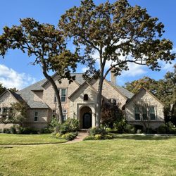 Sion Tree Service - Front of the house after trimming and removing trees. Beautiful!!