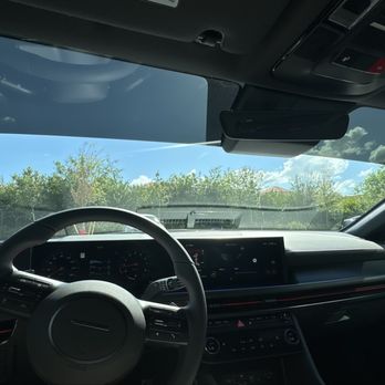 Planet Tint - Inside of the car with the sun strip - Home Window Tinting Near Me - Fort Myers, Florida Planet Tint - Inside of the car with the sun strip - Home Window Tinting Near Me - Fort Myers, Florida