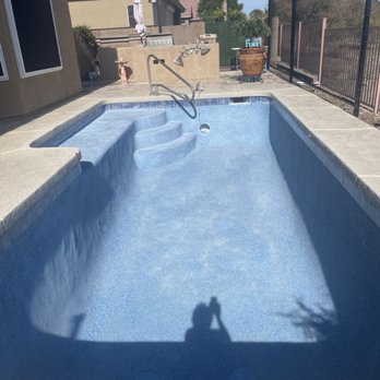 Tropics Pools & Spas - New finish installed waiting for acid cleaning - Pool & Hot Tub Service Near Me