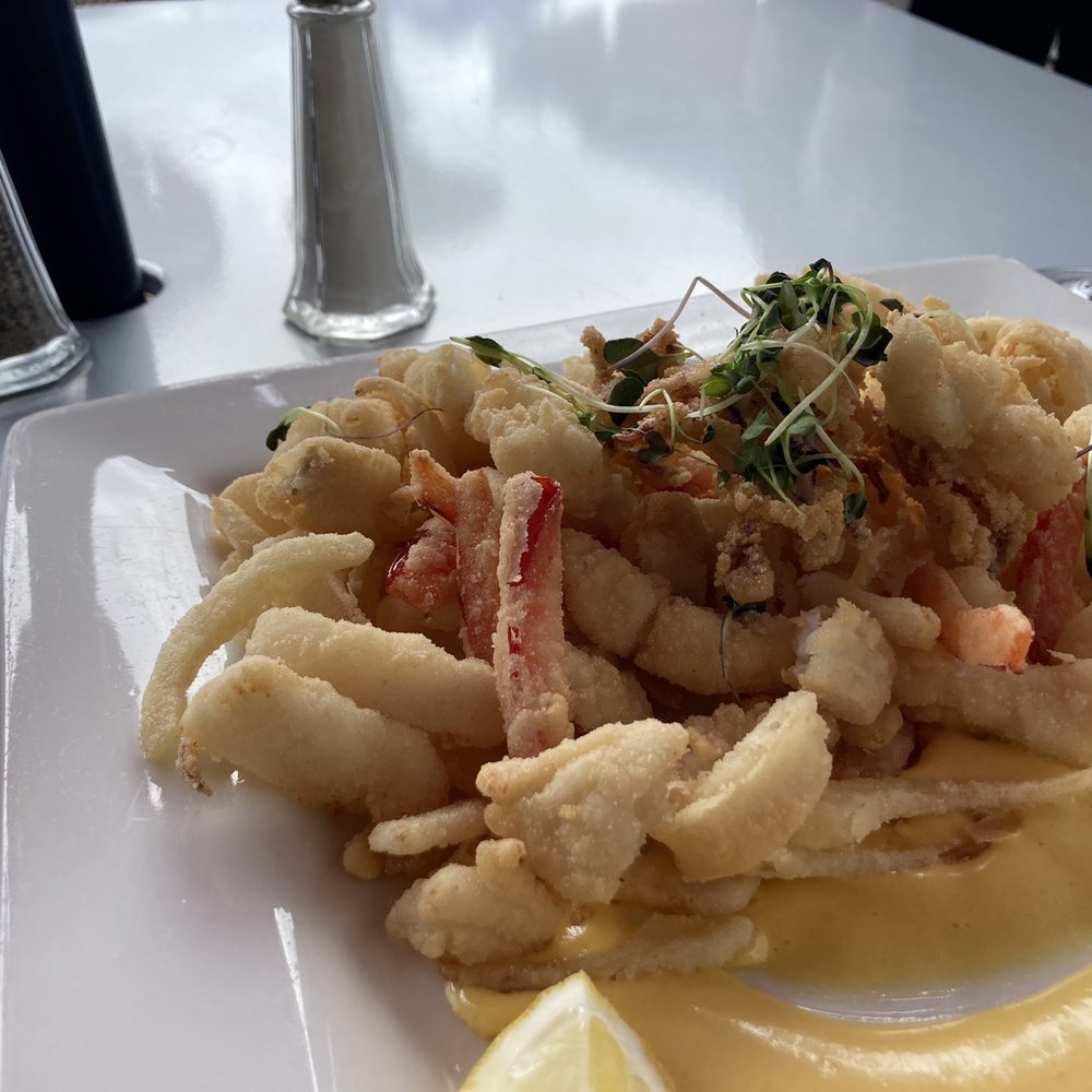 Viera on Main - Misto frito - a collection of bite-sized seafood pieces garnished with a spicy aioli. - New American Near Me - Chatham, Massachusetts Viera on Main - Misto frito - a collection of bite-sized seafood pieces garnished with a spicy aioli. - New American Near Me - Chatham, Massachusetts
