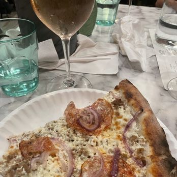 Flo's Wine Bar & Bottle Shop - Sweet sausage pizza and Rosé - Wine Bars Near Me - Austin, Texas