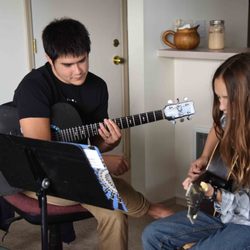 Jonny Akamu Music Lesson - Learning guitar is fun!