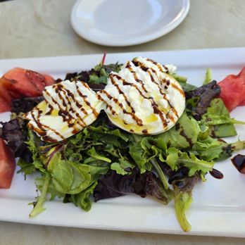 Toscana - Green salad with burrata and watermelon - Pizza Near Me - Solvang, California Toscana - Green salad with burrata and watermelon - Pizza Near Me - Solvang, California