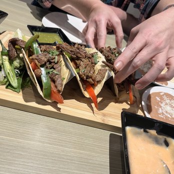 Queens Bar & Grill - Fajita Beef Street Tacos with receipts and rice.... Amazing flavor! - Mexican Near Me - Fayetteville, Arkansas Queens Bar & Grill - Fajita Beef Street Tacos with receipts and rice.... Amazing flavor! - Mexican Near Me - Fayetteville, Arkansas