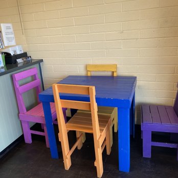 Hangry Dog - Small table to sit at. - Tacos Near Me - Sunset, Utah