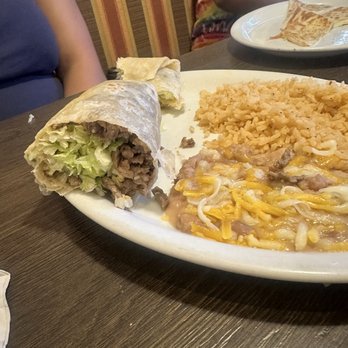 Mi Cocina - This plate it's the original burrito the bean and rice those are for a kids quesadilla. First time I saw a lettuce inside in a burrito - Mexican Near Me - Highland, California Mi Cocina - This plate it's the original burrito the bean and rice those are for a kids quesadilla. First time I saw a lettuce inside in a burrito - Mexican Near Me - Highland, California