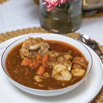 Dijah’s Kitchen - a bowl of stew on a plate - African Near Me - Lynnwood, Washington
