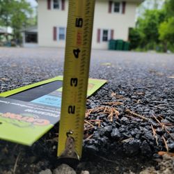 Custom Paving and Seal Coating - Ashault 1.5 inches directly.on grass.