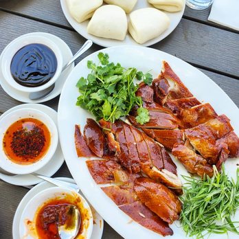 Kwok's Bistro - Whole duck with buns $40. So crispy! That chili jam is the bomb too!! - Chinese Near Me - Reno, Nevada Kwok's Bistro - Whole duck with buns $40. So crispy! That chili jam is the bomb too!! - Chinese Near Me - Reno, Nevada