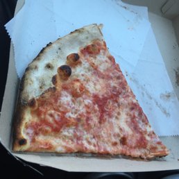 A slice of Original Patsy's Pizza. It's definitely one of a kind. Perfection