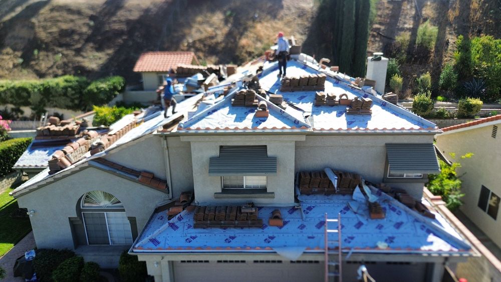 Slide of Pacific Roofers