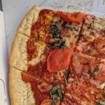 Giordano's - a pizza with tomatoes and basil - Pizza Near Me - Downers Grove, Illinois Giordano's - a pizza with tomatoes and basil - Pizza Near Me - Downers Grove, Illinois