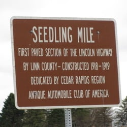 Lincoln Highway Iowa Seedling Mile - Sign indicating the start of the seedling mile.