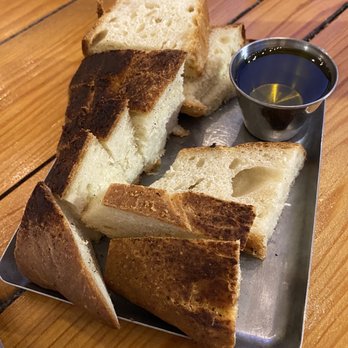 Amici 30A Italian Kitchen - Complimentary bread and olive oil - Italian Near Me - Inlet Beach, Florida Amici 30A Italian Kitchen - Complimentary bread and olive oil - Italian Near Me - Inlet Beach, Florida