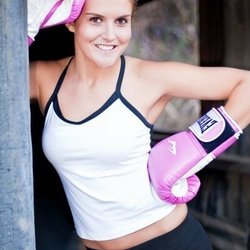 Duke's Boxing and Fitness - Jessie showing off her pink gloves.
