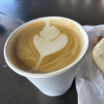 Lucky Goat Coffee - Cappuccino and a Sausage Roll. - Coffee & Tea Near Me - College Station, Texas