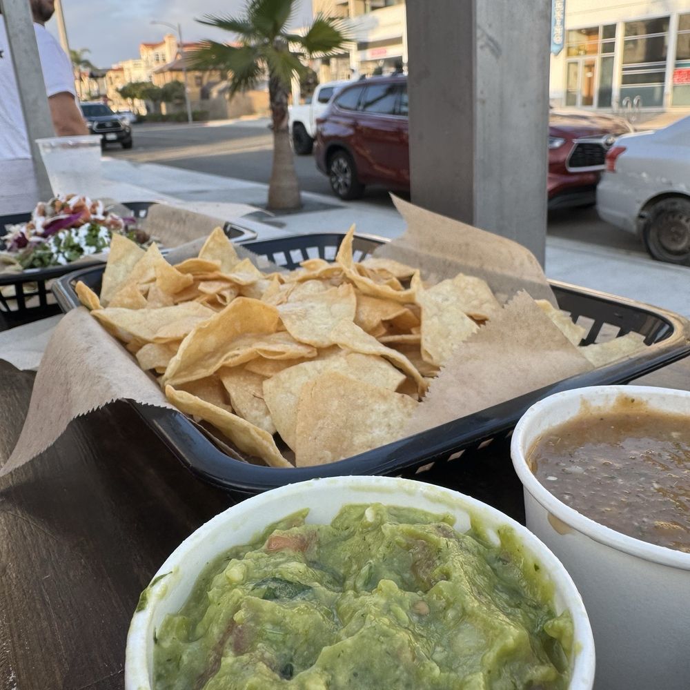 Sancho's Tacos - Crunchy nachos with guacamole and salsa! - Mexican Near Me - Huntington Beach, California Sancho's Tacos - Crunchy nachos with guacamole and salsa! - Mexican Near Me - Huntington Beach, California