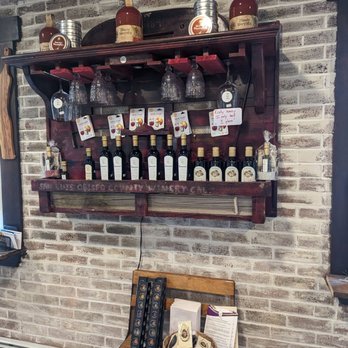 The Cheese Factory - a display of cheeses and wine - Cheese Shops Near Me - Orchard Park, New York