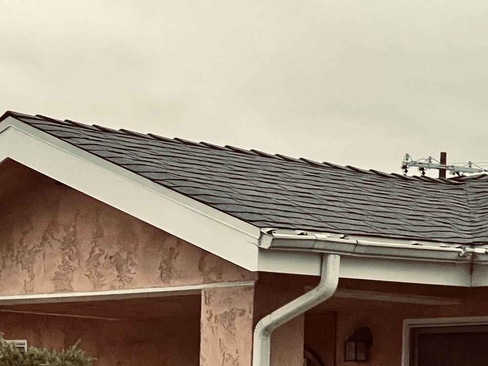 Slide of HGG Roofing