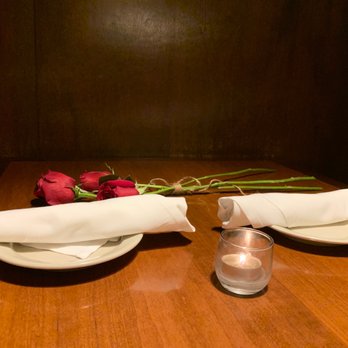 Spezia - Private table with the curtain allows some privacy for more special dates. - Italian Near Me - Omaha, Nebraska