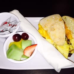 The Bistro - Breakfast sandwich with a side of fruit!
