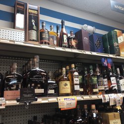 Camelot Wine Merchants - Nice bourbon collection Bookers $100 a bottle...no Blantons