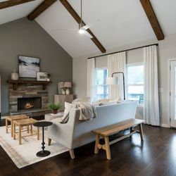 Lake Arrowhead - Red Bud Model Home Family Room with vaulted ceiling , cedar beams and cedar mantle