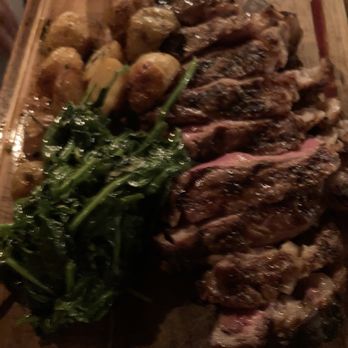 Vite Vinosteria - NY Strip Steak with potatoes and spinach - Italian Near Me - Astoria, New York Vite Vinosteria - NY Strip Steak with potatoes and spinach - Italian Near Me - Astoria, New York