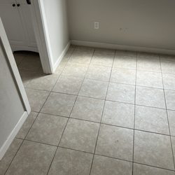 Tile & Grout Solutions - Tiles were bowed up and cracked, cut out replaced like new!