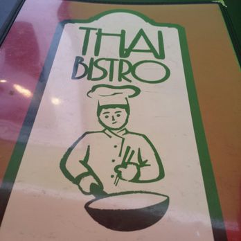 Thai Bistro - a chef holding a frying pan - Thai Near Me - Kitchener, Ontario