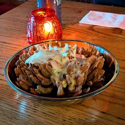 Side Eye - Blooming onion topped with gruyere