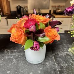 Petali Flowers - $150 plus tax for 7 roses, 8 tulips, 3 ranunculus, and 6 lilies... looks like it came from 1-800-flowers.