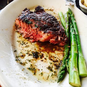 Las Brisas - No words! Medium rare 16 oz ribeye split on a steaming plate laden in melted, seasoned butter and asparagus cooked to perfection!!! - Steakhouses Near Me - Lubbock, Texas Las Brisas - No words! Medium rare 16 oz ribeye split on a steaming plate laden in melted, seasoned butter and asparagus cooked to perfection!!! - Steakhouses Near Me - Lubbock, Texas