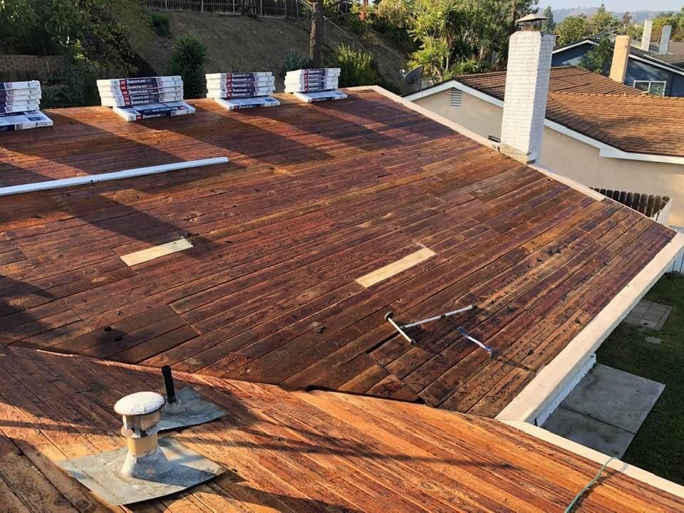 Slide of Caballeros Roofing