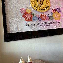 two large dole whip soft serves (back), regular size ice cream (center) two large dole whip soft serves (back), regular size ice cream (center)