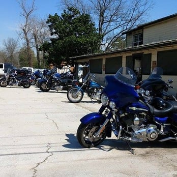 Alamo Bar & Grill - a row of motorcycles parked in front of a restaurant - Bars Near Me - Houston, Texas Alamo Bar & Grill - a row of motorcycles parked in front of a restaurant - Bars Near Me - Houston, Texas