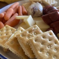 ALDI - Jalapeño venison sausage, white cheddar and almond crackers, cranberry goat cheese, white cheddar cheese +baby carrots