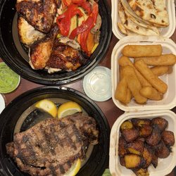 Chicken Feastin - Yuka Fries Tztziki Dip Rib Eye Steak (16 Oz) Pita Bread Sauce Can Soda Grilled Vegetables Sweet Plantains 1/2 Chicken Combo