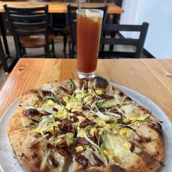 The weekend brunch specials, Bloody Mary and breakfast pizza