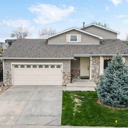 Maria Hambrick - Compass - 1173 Fall River Creek, Longmont, CO 80504. This spacious, 
5-bedroom, 3-bathroom house combines comfort and elegance.