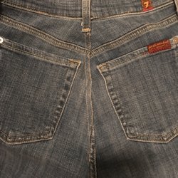 The Tailors - Here, you can see the pockets are tilted, uneven, and less than 1 inch apart.